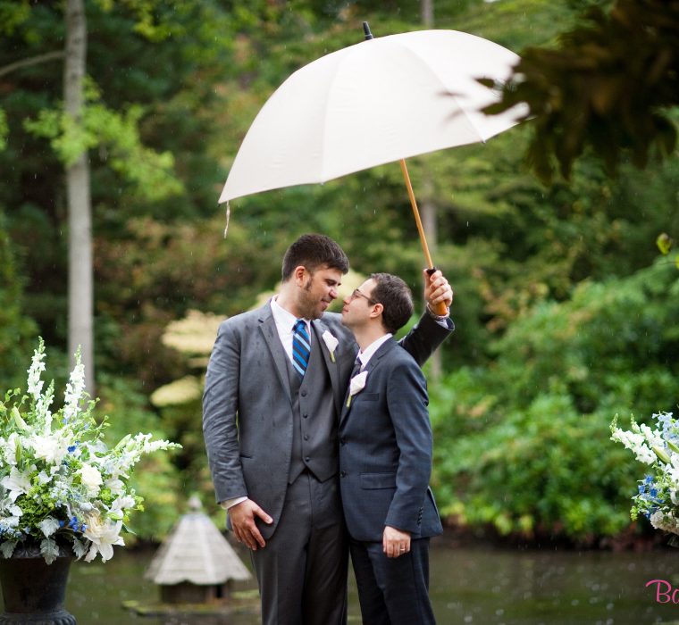 Married gentlemen couple with white umbrella. Barbie Hull Photography